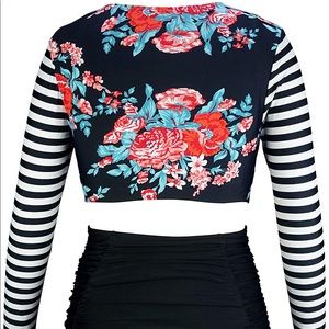 Rash guard long sleeve swimsuit, high bottoms.